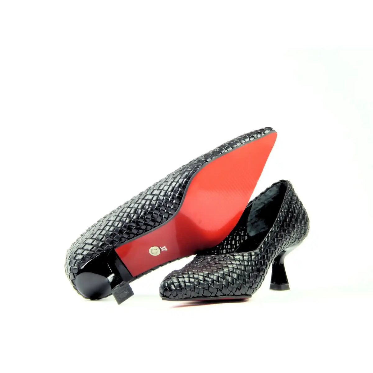 Black woven heel showing the red outsole